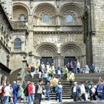 Crowds leave from a side door after Mass