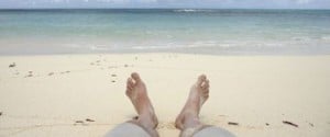 Fisherman lying on a beautiful beach